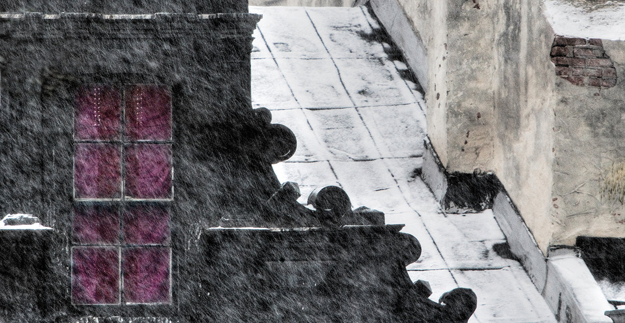 Aubergine Drapes Against the Snow