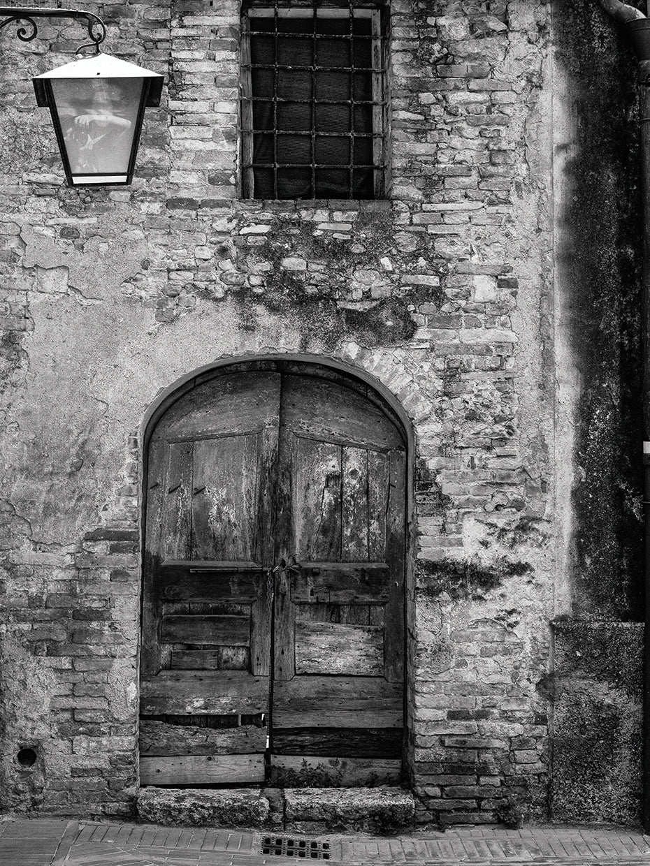 San Giminiano Door handcrafted art work on canvas or framed canvas prints by Moises Levy