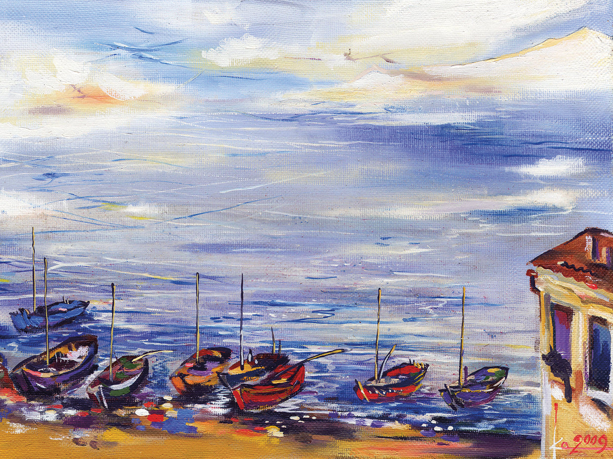 Fishing Boats on a Break Beach