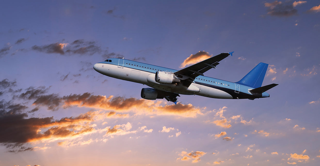 Airplane in Sunset Skies