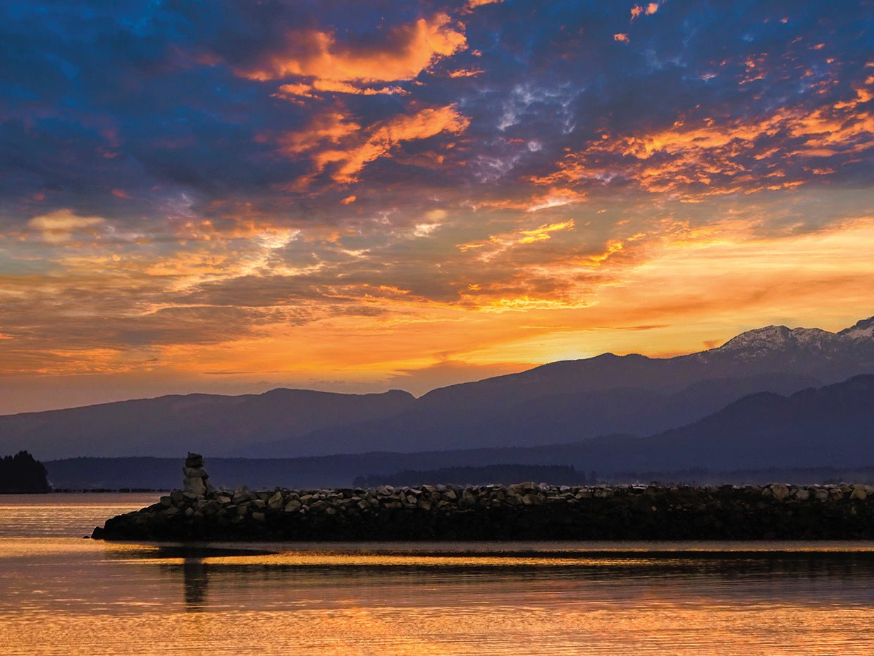 Inukshuk In Setting Sun
