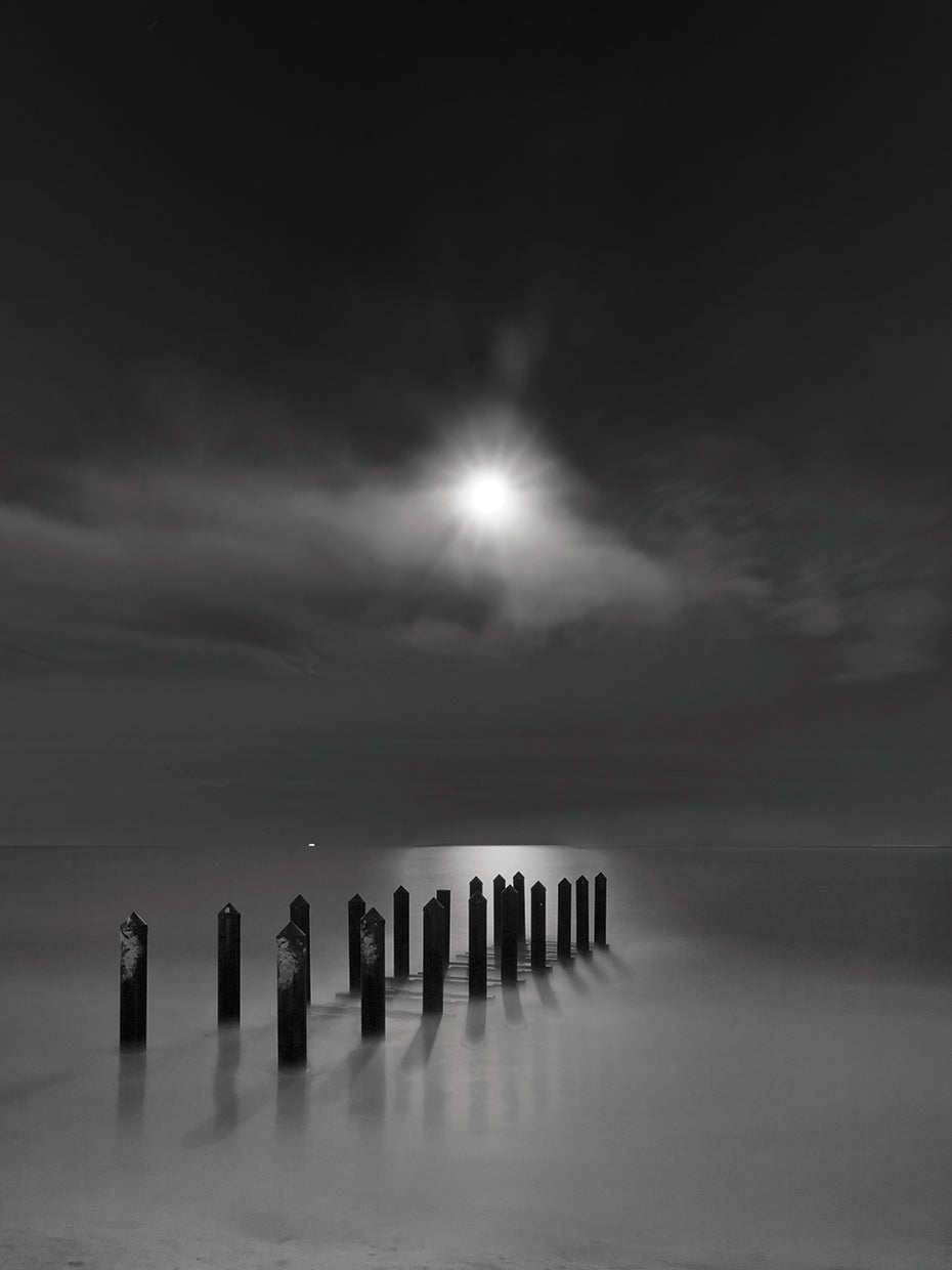 Eighteen Pilings Beneath the Rising Moon