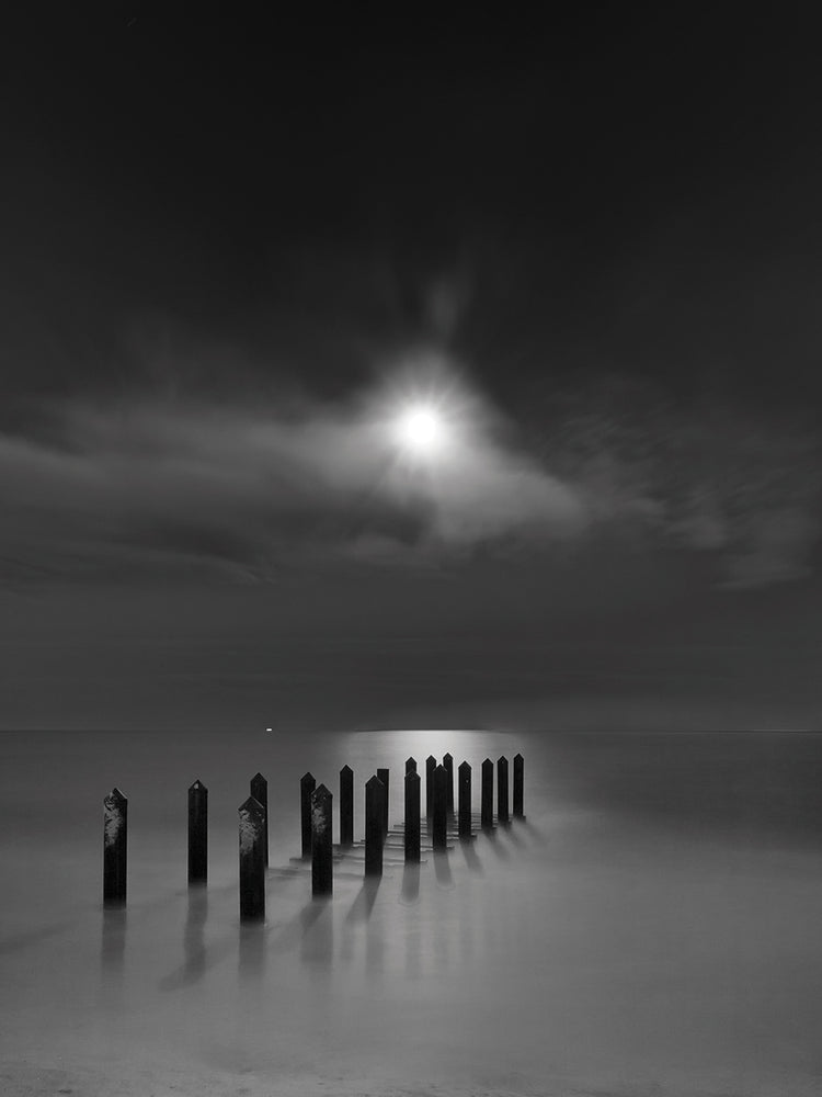 Eighteen Pilings Beneath the Rising Moon