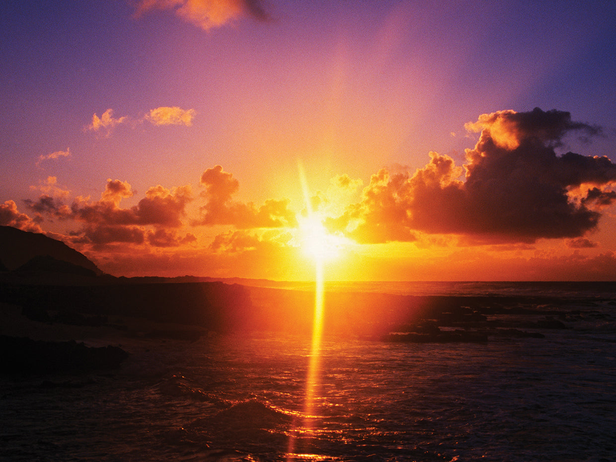 Puesta de sol ardiente sobre el océano Lienzo