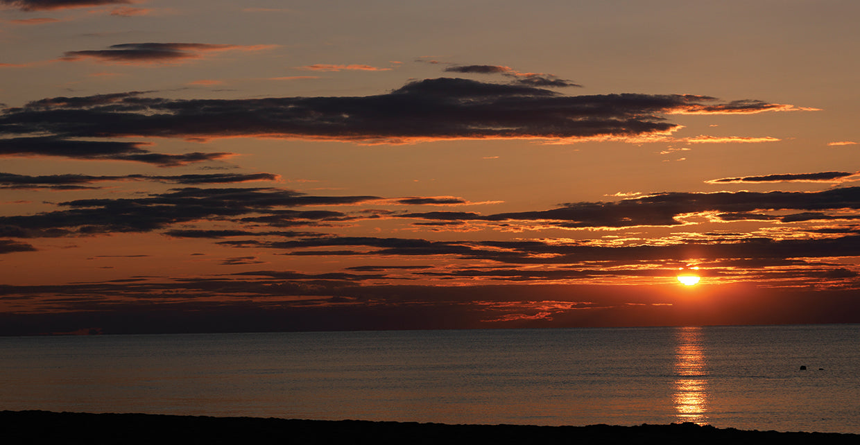 Sunset over Jetties Beach