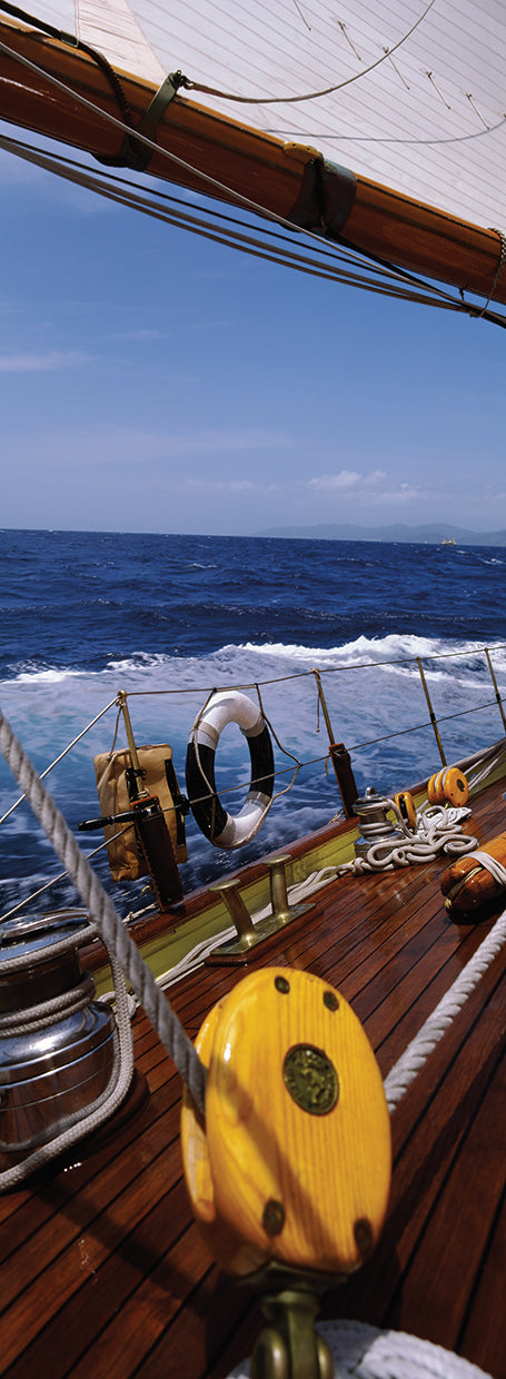 Wooden Sailboat at Sea