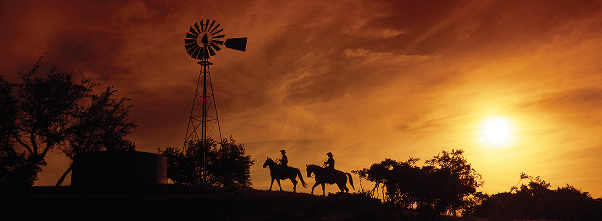 Horse Riders in Texas Sunset