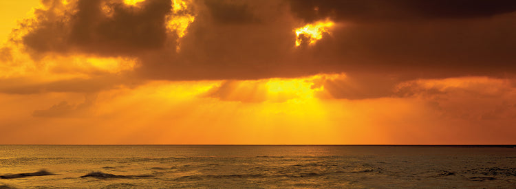 Radiant Sunbeams Over the Ocean