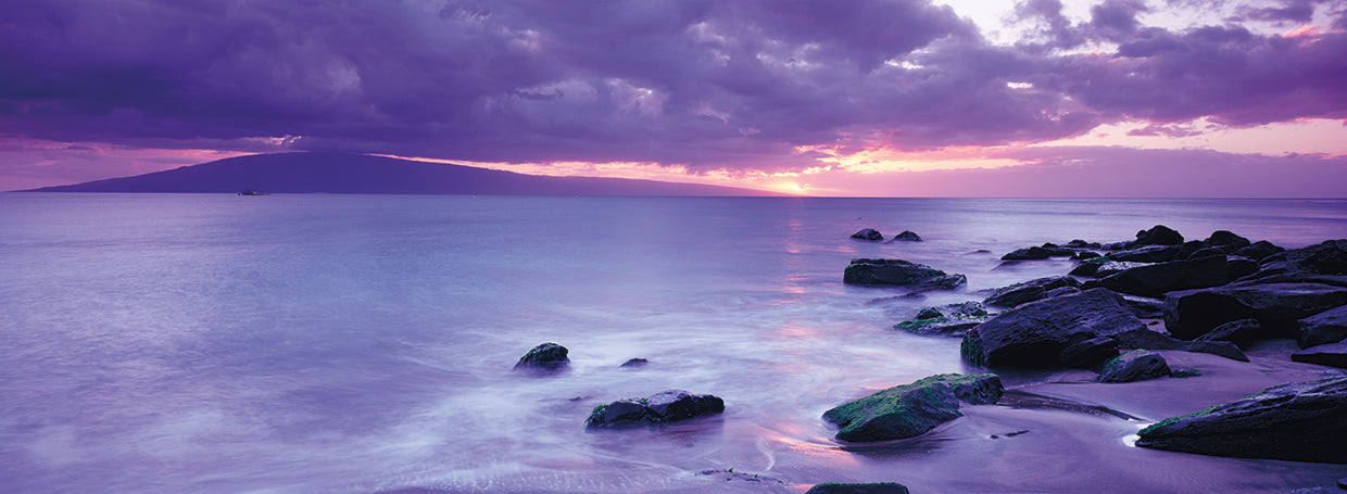 Rocks on coast at sunset, Maui, Hawaii