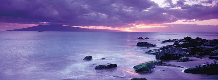 Rocks on coast at sunset, Maui, Hawaii