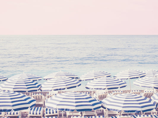 Riviera Umbrellas Pink Sky Canvas Print