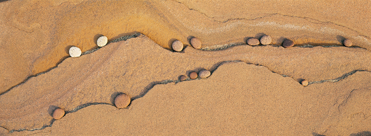 High angle view of stones on sand, Lake Superior, Michigan, USA