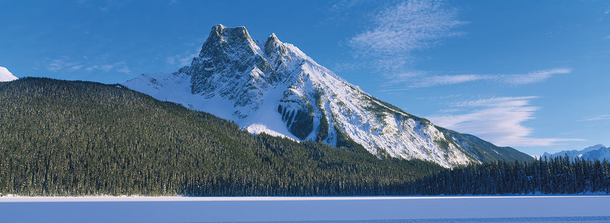 Snowcapped mountain near a frozen lake, Emerald Lake, Yoho National Park, British Columbia, Canada