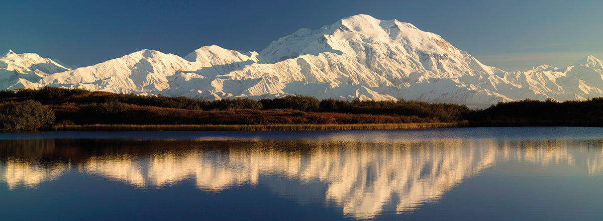 Reflection of snow covered mountains on water, Mt McKinley, Denali National Park, Alaska, USA
