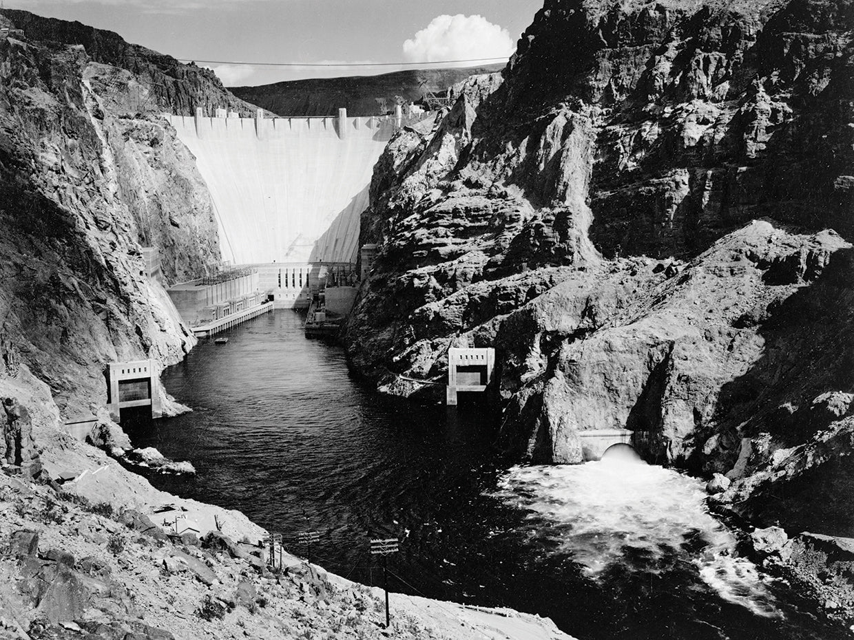 Looking Across River To Dam